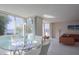 Sunlit living room with floor to ceiling windows and views of the harbor at 660 Island Way #206 # 206, Clearwater, FL 33767