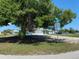 This lovely home is located on a corner lot in a quiet neighborhood. Two-car garage at 7322 Ellis Ln, Port Charlotte, FL 33981