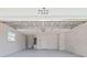 The spacious two-car garage features a bright interior and is ready for your vehicles or storage needs at 7322 Ellis Ln, Port Charlotte, FL 33981