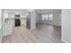 Open-concept living area with modern kitchen, creating a spacious and inviting atmosphere at 7322 Ellis Ln, Port Charlotte, FL 33981