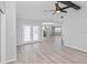 Bright living area with a view of the modern kitchen and stylish flooring at 7322 Ellis Ln, Port Charlotte, FL 33981