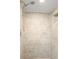Shower tiled in neutral colors at 859 Harbor Hill Dr, Safety Harbor, FL 34695