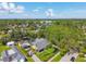 A beautiful home with a screened patio and mature trees in a quiet neighborhood setting at 859 Patterson Dr, Sarasota, FL 34234