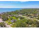 Coastal living at its finest with this aerial view of a community near the water and lush greenery at 859 Patterson Dr, Sarasota, FL 34234