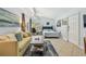 Cozy bedroom with comfortable seating, a well-lit desk area, and serene decor at 859 Patterson Dr, Sarasota, FL 34234