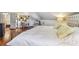 Spacious bedroom features hardwood floors, natural light, and a cozy, comfortable aesthetic at 859 Patterson Dr, Sarasota, FL 34234
