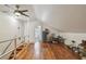 Bright bonus room, perfect for versatile living with storage, a ceiling fan, and natural light at 859 Patterson Dr, Sarasota, FL 34234