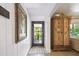 Entry hall with views to living room and front door at 859 Patterson Dr, Sarasota, FL 34234