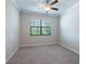 Bedroom filled with natural light featuring a large window with shades for privacy at 9860 Smarty Jones Dr, Ruskin, FL 33573