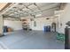 Well-maintained garage with ample storage space, shelving, and a clean, organized layout at 9860 Smarty Jones Dr, Ruskin, FL 33573