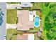 Aerial view showing home, pool, patio, and privacy fence at 11082 90Th Ter, Seminole, FL 33772