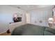 A serene bedroom with a large mirror, closet, and dresser at 11082 90Th Ter, Seminole, FL 33772