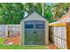 Backyard shed that complements the well-manicured backyard at 11082 90Th Ter, Seminole, FL 33772