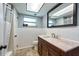 Traditional bathroom with a single sink, updated vanity and decorative mirror at 11398 88Th Ave, Seminole, FL 33772