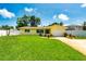 Charming single-story home with a well-manicured lawn and driveway at 11398 88Th Ave, Seminole, FL 33772