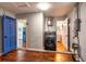 Spacious laundry room with new washer and dryer appliances and wood floors at 11398 88Th Ave, Seminole, FL 33772
