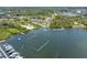 Aerial view of community docks and boat storage, highlighting boating and waterfront amenities available to residents at 1242 Windy Bay Shl, Tarpon Springs, FL 34689