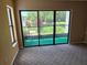 Relaxing outdoor patio area featuring a view of the water at 1281 Pine Ridge E Cir # B1, Tarpon Springs, FL 34688