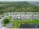 Aerial view of a neighborhood with a large preserve area to the north at 12835 Wildflower Meadow Dr, Riverview, FL 33579
