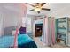 Bedroom with a loft bed, a ceiling fan and a window at 12835 Wildflower Meadow Dr, Riverview, FL 33579