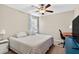 Bedroom with a queen bed, a desk and a ceiling fan at 12835 Wildflower Meadow Dr, Riverview, FL 33579