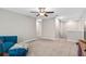 Spacious bonus room featuring neutral tones and ample natural light, ideal for versatile use at 12835 Wildflower Meadow Dr, Riverview, FL 33579