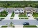 Charming two-story home featuring a well manicured lawn and two-car garage at 12835 Wildflower Meadow Dr, Riverview, FL 33579