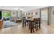 Inviting living and dining areas with tile floors, comfortable seating, and stylish decor at 12835 Wildflower Meadow Dr, Riverview, FL 33579