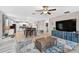 Open-concept living room with access to the kitchen, dining room and living area at 12835 Wildflower Meadow Dr, Riverview, FL 33579