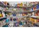 Walk-in pantry provides organized storage with multiple shelves for all your essentials at 12835 Wildflower Meadow Dr, Riverview, FL 33579