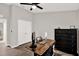 Bedroom with a fan, a desk, and a view of a big closet at 13111 Fruitville Way, Riverview, FL 33579