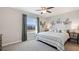 Comfortable bedroom with large window and stylish decor, offering a peaceful retreat at 133 Mangrove Shade Cir, Apollo Beach, FL 33572