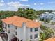 Aerial view of a residential building with a distinct orange tile roof at 1340 Bayshore Blvd # 502, Dunedin, FL 34698