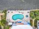 Overhead view of the beautiful community pool and bay at this waterfront property at 1340 Bayshore Blvd # 502, Dunedin, FL 34698