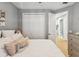 Comfortable bedroom with closet and view to bathroom at 1340 Bayshore Blvd # 502, Dunedin, FL 34698