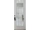 Interior door view showing a hallway with white tile and modern furniture at 1340 Bayshore Blvd # 502, Dunedin, FL 34698