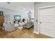 Comfortable living room with hardwood floors, ceiling fan and natural light at 1340 Bayshore Blvd # 502, Dunedin, FL 34698