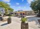 Charming outdoor brewery space with picnic tables, orange umbrellas and inviting, relaxed seating arrangement at 1340 Bayshore Blvd # 502, Dunedin, FL 34698