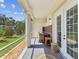 Cozy patio with furniture, screen, and a view of the backyard at 1340 Bayshore Blvd # 502, Dunedin, FL 34698
