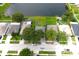 Aerial view of the homes along the lakeside with mature trees and well-manicured lawns in a quiet residential area at 1423 Birchstone Ave, Brandon, FL 33511