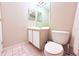 Small bathroom with a tile floor, vanity, and toilet at 1423 Birchstone Ave, Brandon, FL 33511