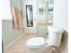 Bathroom featuring a toilet, vanity, and mirror at 1423 Birchstone Ave, Brandon, FL 33511