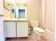 Bathroom featuring a sink vanity, toilet, and tiled flooring at 1423 Birchstone Ave, Brandon, FL 33511
