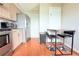 Kitchen has stainless appliances, and island with barstool seating at 1423 Birchstone Ave, Brandon, FL 33511