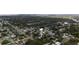 Desirable residential area featuring a mix of homes surrounded by greenery and close to amenities at 1506 Winding W Way, Clearwater, FL 33764