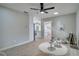 A versatile bonus room provides flexible living space with neutral walls and ample natural light at 1506 Winding W Way, Clearwater, FL 33764