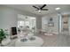 An inviting living room with playful decor, seamlessly connected through an open layout at 1506 Winding W Way, Clearwater, FL 33764
