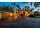 Beautiful home featuring well-manicured landscaping and ample parking, offering a great first impression and curb appeal at 16205 Sentry Woods Ct, Odessa, FL 33556
