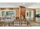 Kitchen with a stainless sink, granite counters, and view of the lake at 16205 Sentry Woods Ct, Odessa, FL 33556