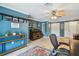Cozy office space with built-in shelving, comfortable desk, and chair at 16205 Sentry Woods Ct, Odessa, FL 33556